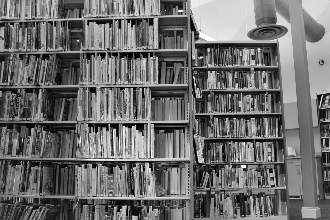 nonfiction pomeroy library stacks in black and white