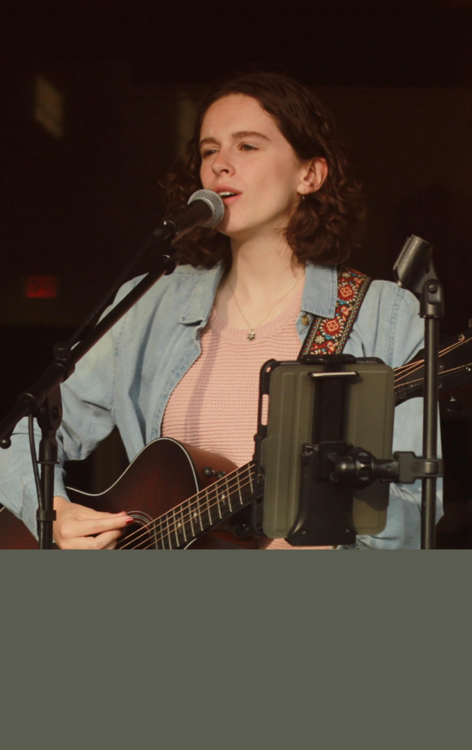 Jalyn Short singing into a microphone